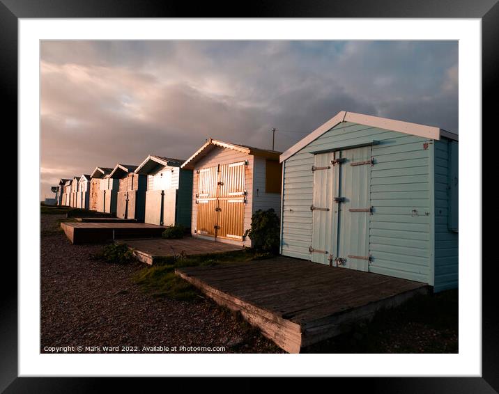 Glowing Autumn Beach huts Framed Mounted Print by Mark Ward