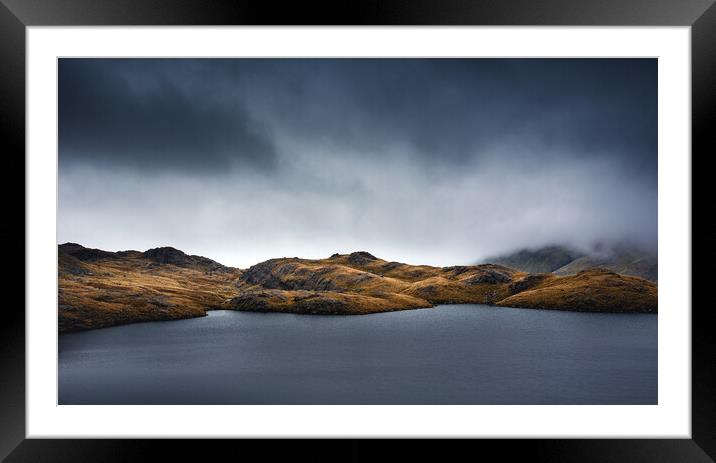 Sprinkling Tarn under moody sky Framed Mounted Print by Alan Wise