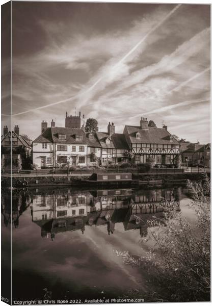 Tewkesbury cottages by the river Canvas Print by Chris Rose