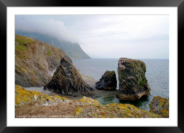 Sea stacks at Trefor, Wales. Framed Mounted Print by john hill