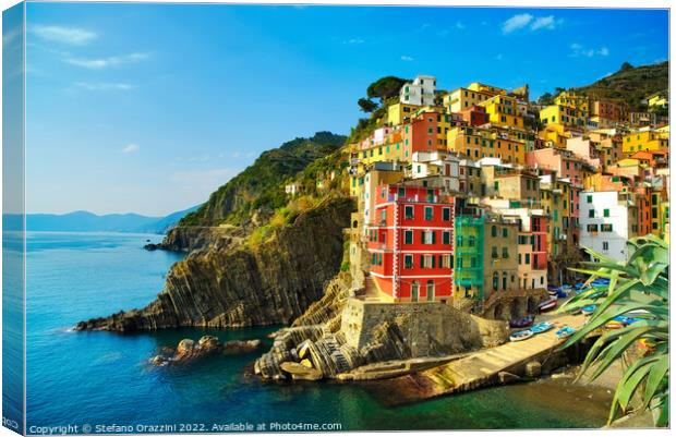Riomaggiore village on the sea. Cinque Terre, Italy Canvas Print by Stefano Orazzini