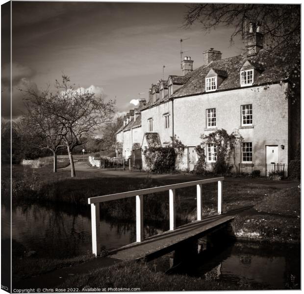 Lower Slaughter, riverside cotswold cottages Canvas Print by Chris Rose