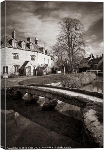 Lower Slaughter, riverside cotswold cottages Canvas Print by Chris Rose