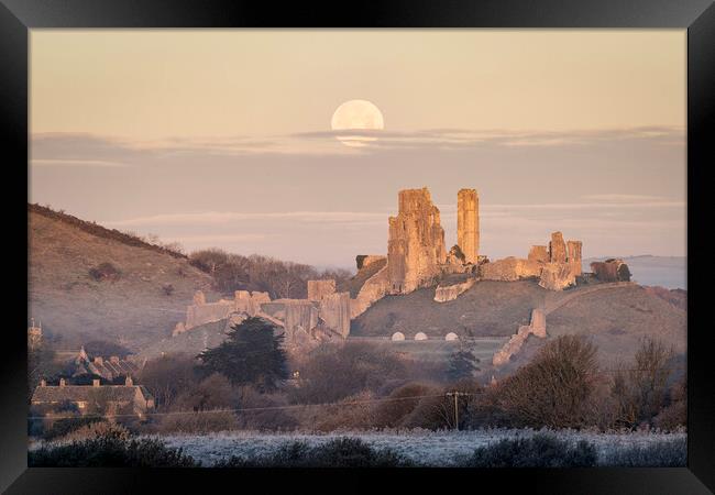Corfe Castle under a setting moon Framed Print by David Semmens