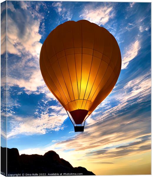 Hot Air Balloon Flying over Rocky Mountaintop at Sunset Canvas Print by Dina Rolle