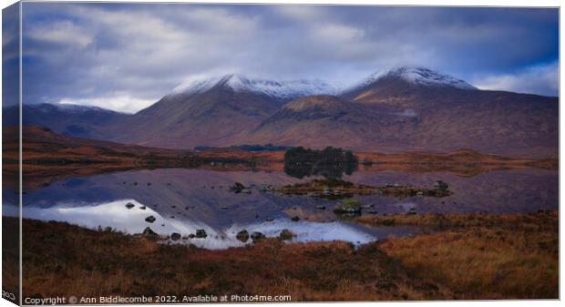 Reflections of Glencoe in Scotland Canvas Print by Ann Biddlecombe