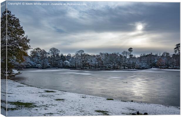 Icy lake in Surrey Canvas Print by Kevin White