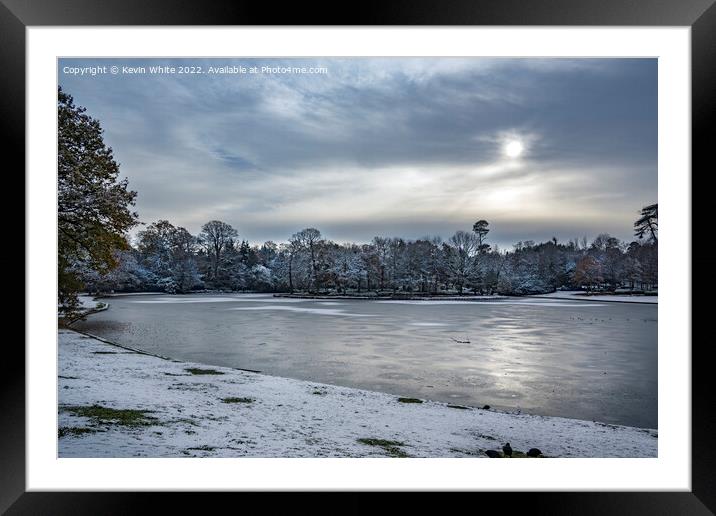 Icy lake in Surrey Framed Mounted Print by Kevin White