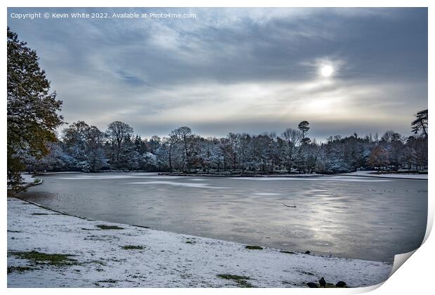 Icy lake in Surrey Print by Kevin White