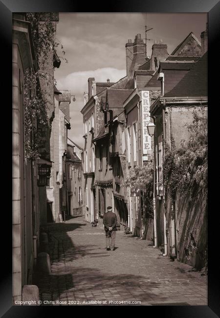 Angers street, France Framed Print by Chris Rose