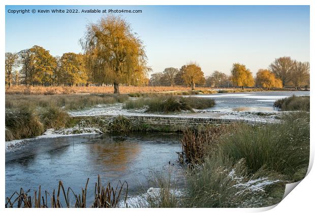 Frozen landscape of Bushy Park ponds Print by Kevin White