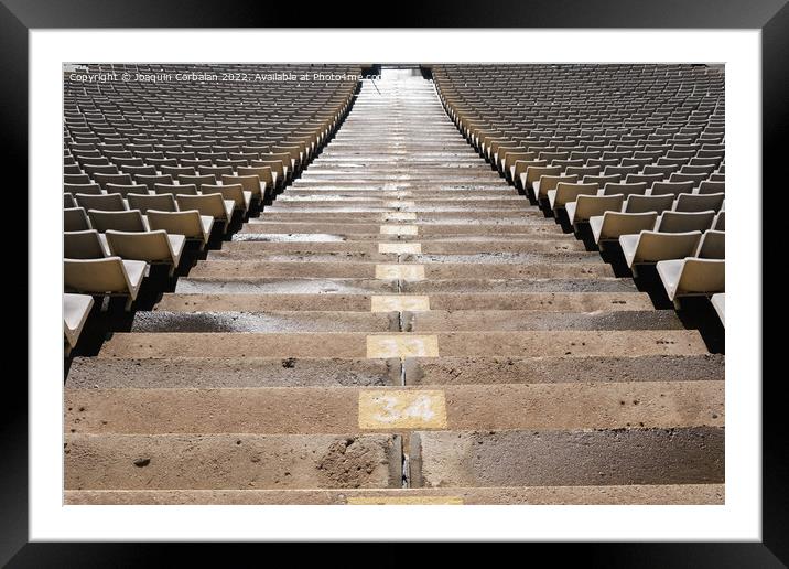 Detail of the empty stands of a large sports stadium, without at Framed Mounted Print by Joaquin Corbalan
