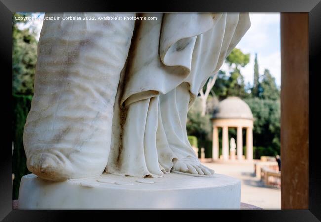 Detail of a marble statue out of focus in the background of a cl Framed Print by Joaquin Corbalan