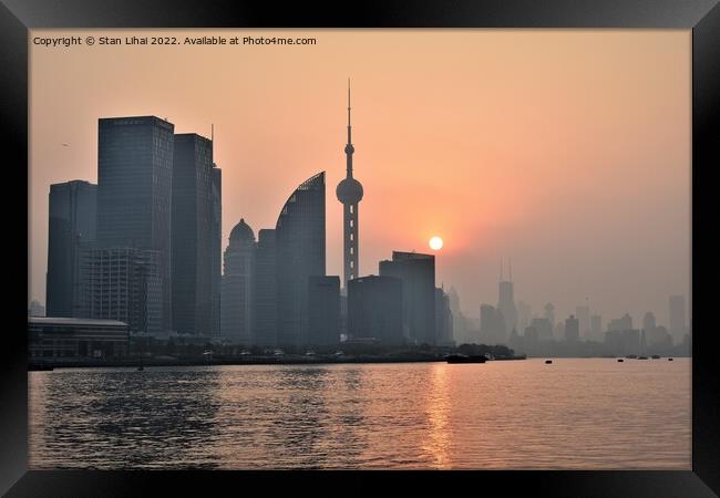 Sunset over the Huangpu river in Shanghai Framed Print by Stan Lihai