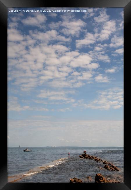 Rocky Coast Fishing Framed Print by Derek Daniel