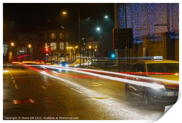 During the Evening of a Rainy Night, a Yellow Taxi Travels Along a Wet Road. Print by Steve Gill