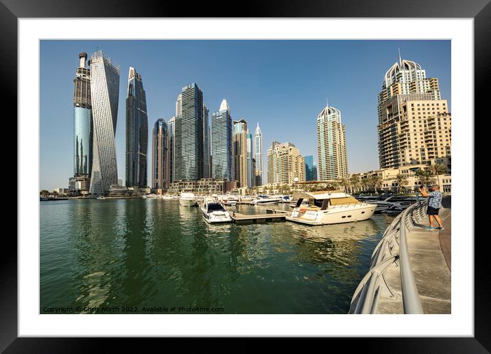 Skyscraper apartments at Dubai Marina Framed Mounted Print by Chris North