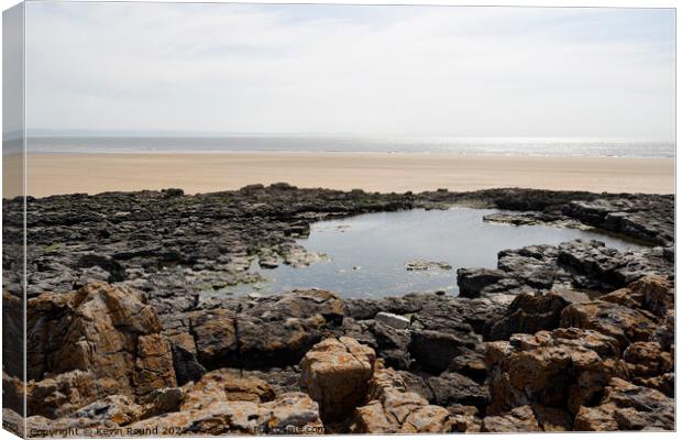 Rock pool at Porthcawl Wales Canvas Print by Kevin Round