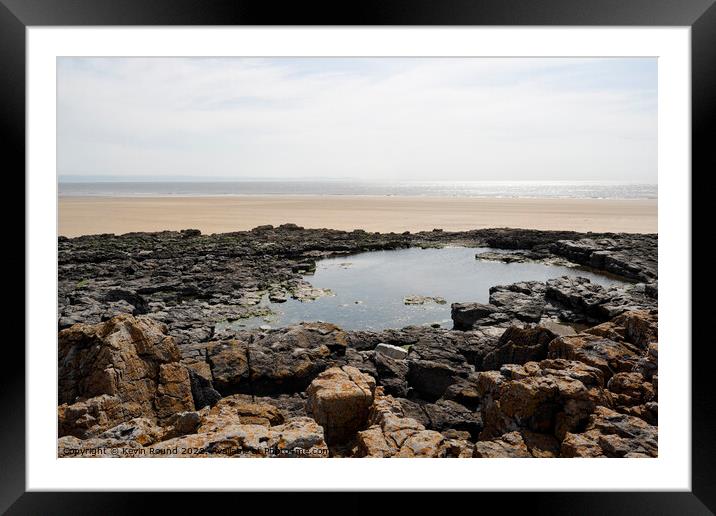 Rock pool at Porthcawl Wales Framed Mounted Print by Kevin Round