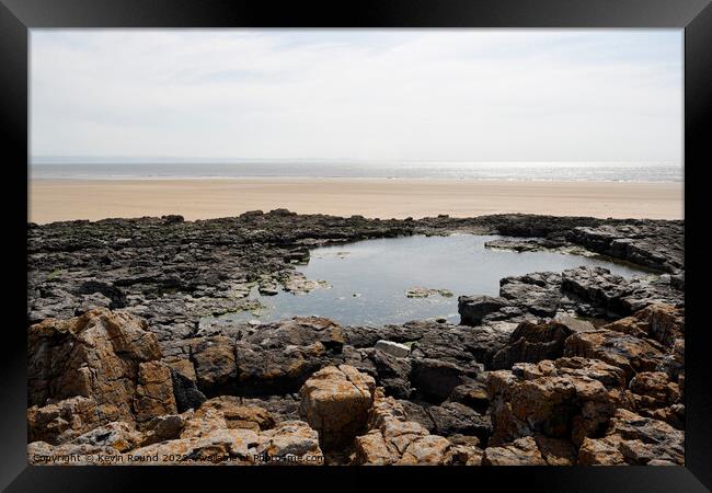Rock pool at Porthcawl Wales Framed Print by Kevin Round