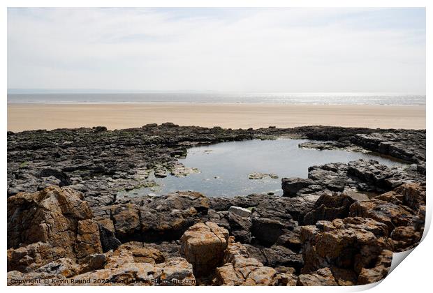 Rock pool at Porthcawl Wales Print by Kevin Round
