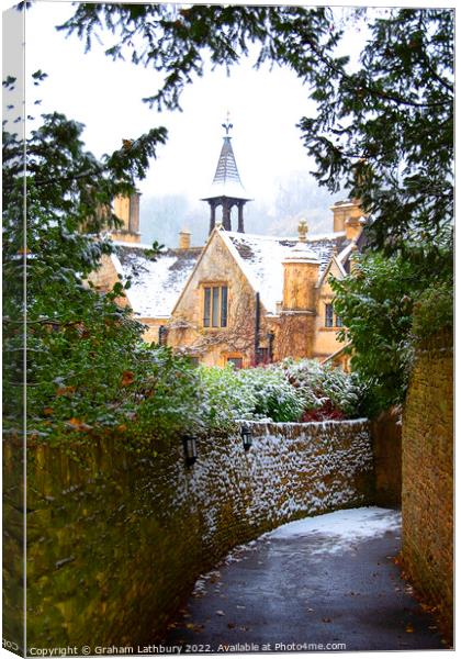 Castle Combe in the snow Canvas Print by Graham Lathbury