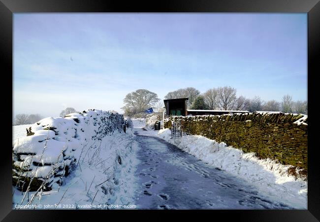 Country lane in Winter. Framed Print by john hill