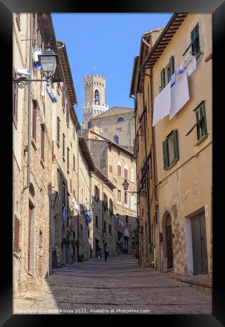 Walking up to the Town Hall - Volterra Framed Print by Laszlo Konya