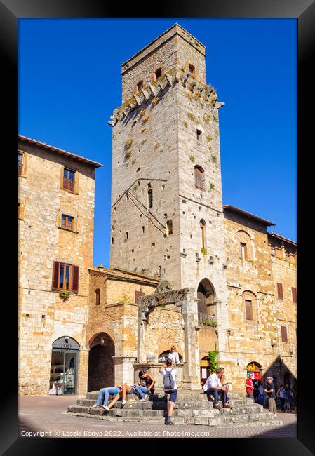 Piazza della Cisterna - San Gimignano Framed Print by Laszlo Konya