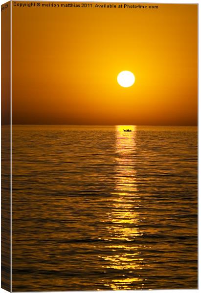 greek island sunset with boat Canvas Print by meirion matthias