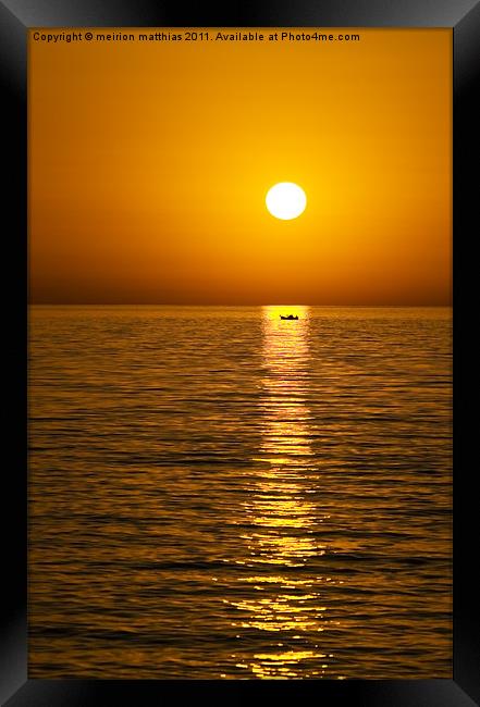 greek island sunset with boat Framed Print by meirion matthias