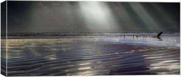 Rays of sunlight at Rhossili Canvas Print by Leighton Collins
