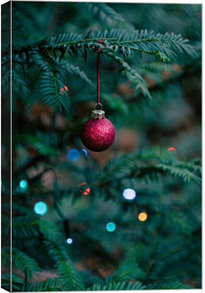 Caldy Christmas Tree Bauble Canvas Print by Liam Neon