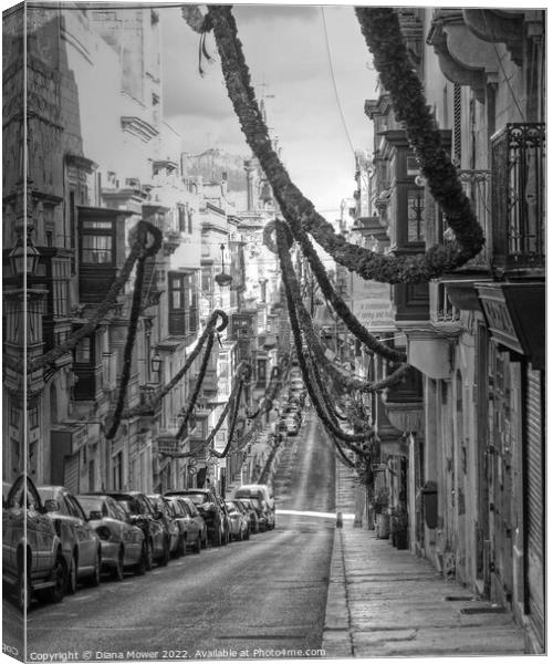 Valletta Street Festival time monochrome Canvas Print by Diana Mower