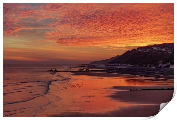 Sunrise over Cromer beach Print by Gary Pearson