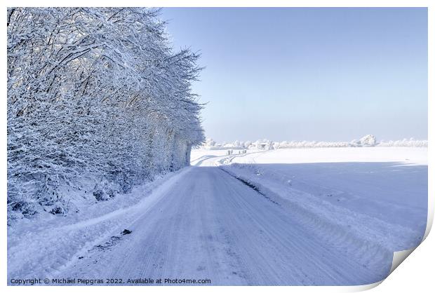 View of a snow-covered country road in winter with sunshine and  Print by Michael Piepgras