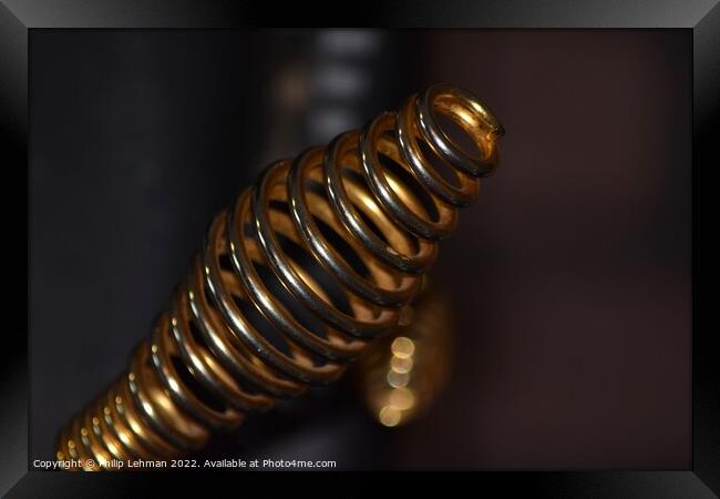 Golden Coil Woodstove Handle A Framed Print by Philip Lehman