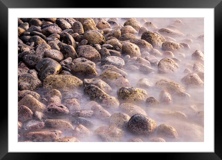 Misty rocks on the shore at dawn Framed Mounted Print by Phil Crean