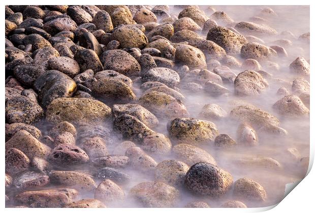 Misty rocks on the shore at dawn Print by Phil Crean