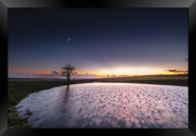 Sunset at the Dew Pond on Ditchling Beacon Framed Print by Mark Jones