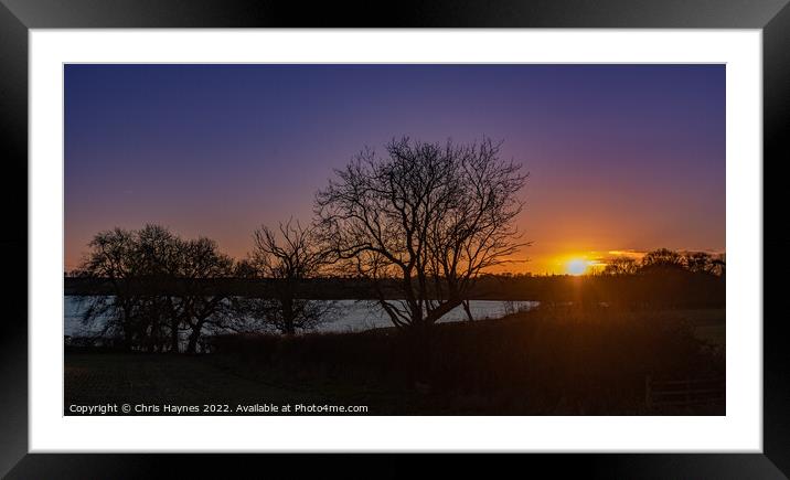 A sunset over Rutland Water Framed Mounted Print by Chris Haynes