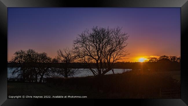 A sunset over Rutland Water Framed Print by Chris Haynes