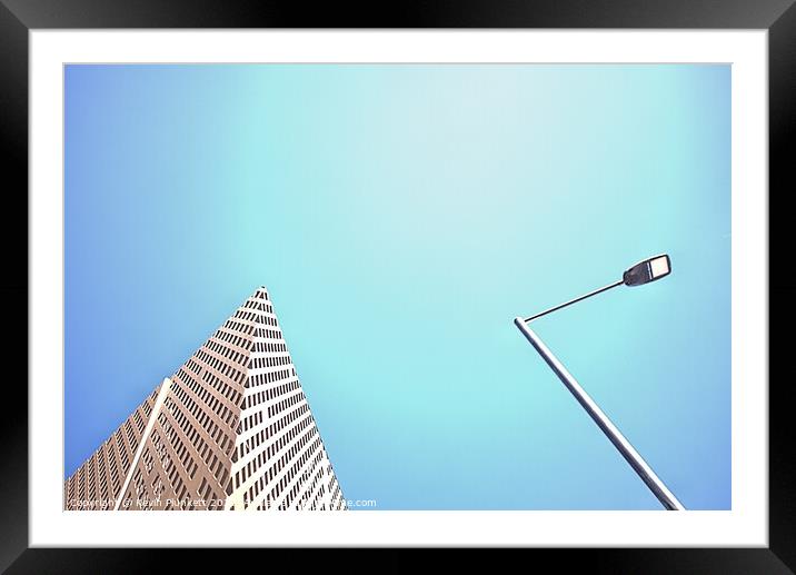 Building and light Framed Mounted Print by Kevin Plunkett
