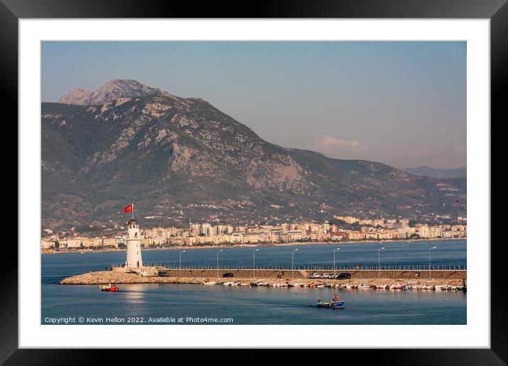 Lighthouse at entrance to Alanya Harbour Framed Mounted Print by Kevin Hellon