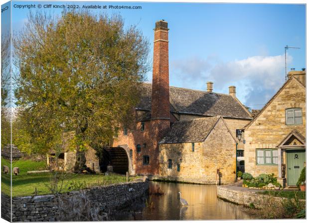The Mill at Lower Slaughter Canvas Print by Cliff Kinch