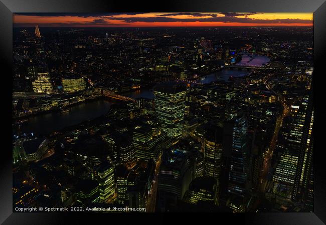 Aerial London illuminated night view financial business center  Framed Print by Spotmatik 
