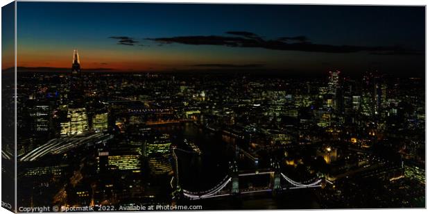 Panoramic Aerial illuminated London view of Tower Bridge England Canvas Print by Spotmatik 