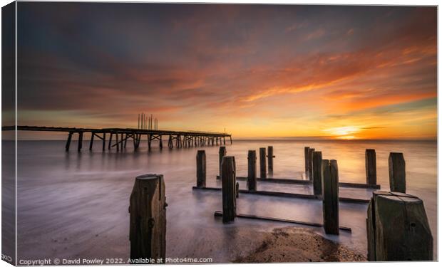 Majestic Sun Rising Over Claremont Pier Canvas Print by David Powley