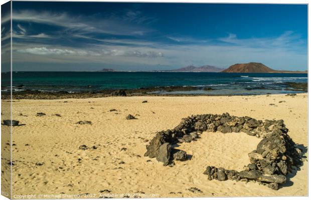 Looking out to sea from one of Corralejo's beaches Canvas Print by Michael Shannon