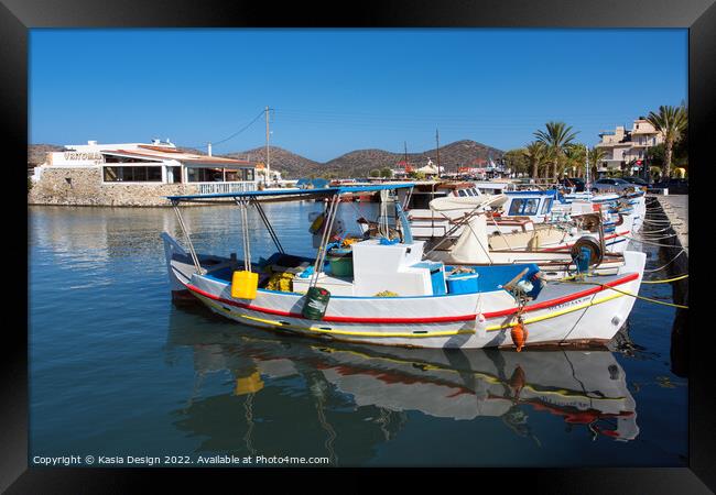Vibrant Fishing Boats in Elounda Harbour Framed Print by Kasia Design